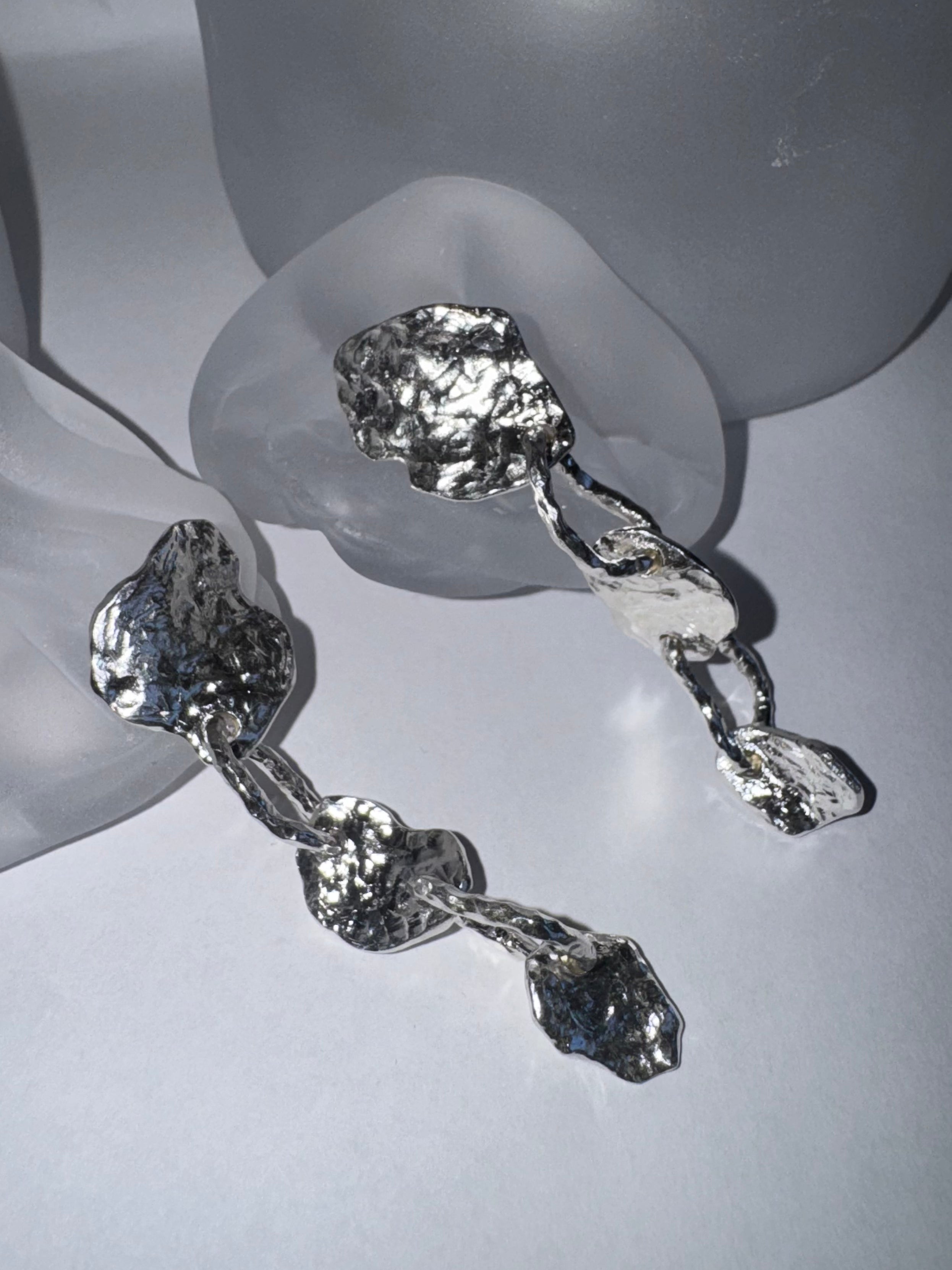 Flow long earrings
