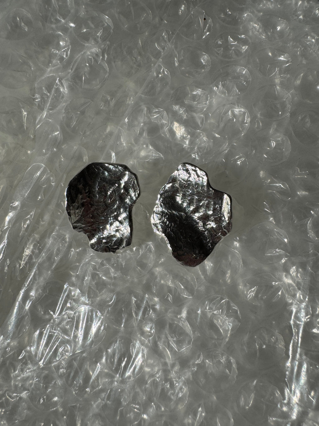 Solid earrings – close-up